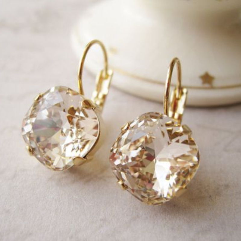 Women Formal Event Wear - Elegant claw-shaped stud earrings with artificial